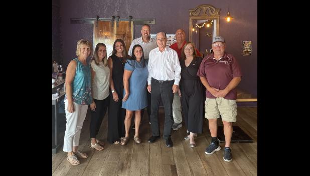Indiana Governor Mike Braun met with several Pulaski County officials on Wednesday, July 8. Pictured (left to right, front) are: Meleita Street, Morgan Federer, Kaila Stukofski, Sheila Hazemi, MacKenzie Ledley, Al Breyfogle and (left to right, back): Mike Tiede and Don Street.  