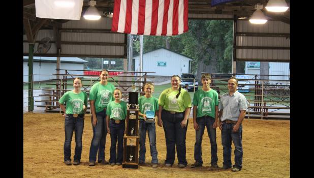 There were six contestants vying for the title of 2026 Ultimate Showman. Pictured (left to right) are: Sophia Watwood, Alana Kasten, Kinzie Bonnell, 2026 Ultimate Showman Brody Bonnell, Karaline Keller, Cameron Hilton and Judge Clinton Shireman.