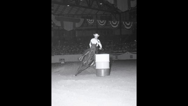 Loretta Manuel barrel racing in Albuquerque, New Mexico, 1965. 