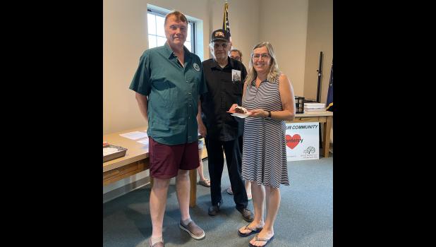 Clerk-Treasurer Linda McCune was recognized for her 25 years of service to the Monterey Town Council. Pictured are President Doug Denton, councilman Jim Fleury, Clerk-treasurer Linda McCune and councilwoman Emily Bailey (back).