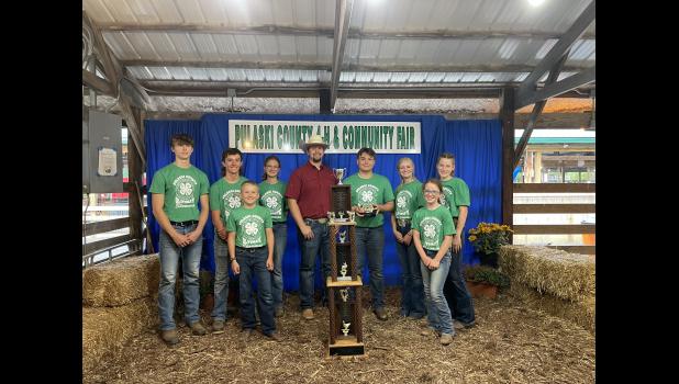 Photo by Megan Galbreath The participants in the 2023 Ultimate Showman competition gathered to congratulate Jacob Sanders on winning the Ultimate Showman title after the competition on Wednesday, June 28. Pictured is Chase Keller (10 year member), Gatlen Olson (seven year member), Brody Bonnell (three year member), Marissa Perry (seven year member), judge Hayden Berenda, Ultimate Showman Jacob Sanders, Taylee Ringen (eight year member), Presley Johnson (five year member) and Sophia Watwood (two year member).