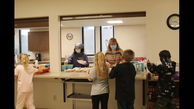 Healthy snacks are provided to the kids at the beginning of each day of the program. Photo by Megan Galbreath.