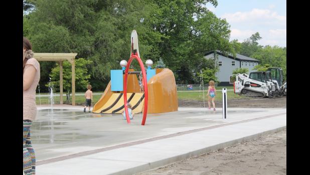 The splashpad being used on its grand opening day on Saturday, June 5.