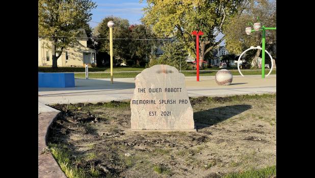 Photo by Megan Galbreath A memorial rock has been added to the front entrance of the Owen Abbott Memorial Splash Pad.