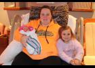 Sarah Stankus, 4, welcomes her new baby sister, Sophia Michelle Stankus, who is the first baby of the new year to be born at Pulaski Memorial Hospital. Mom Abigail Stankus said she wasn’t expecting to have the first baby of the new year.