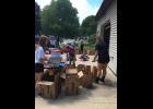 Members of the First United Methodist Church Sunday school helped organize and pack the backpacks on Sunday. Photo Submitted  