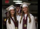 Getting ready to enter the Winamac gymnasium, Salutatorian Avery Wegner and Valedictorian Brooke Rausch share a smile for the camera.