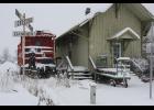 The historic Winamac Train Depot sits quietly during the snowfall on Thursday, Feb. 3.
